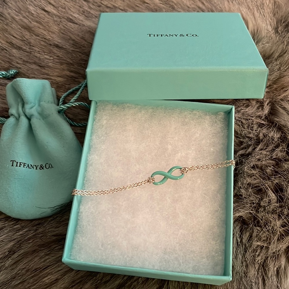 Tiffany & Co. Infinity bracket in silver and blue enamel. Hard to find!